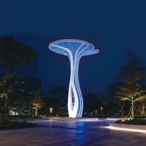 The Aurea Cloud Spire is a next-generation scaulture lighting installation that merges architectural beauty with advanced illumination technology. Designed around a twisted structural column and a floating dual-layer “cloud crown,” this landmark delivers a striking presence during the day and transforms into an immersive light feature at night.