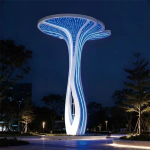 The Aurea Cloud Spire is a next-generation scaulture lighting installation that merges architectural beauty with advanced illumination technology. Designed around a twisted structural column and a floating dual-layer “cloud crown,” this landmark delivers a striking presence during the day and transforms into an immersive light feature at night.