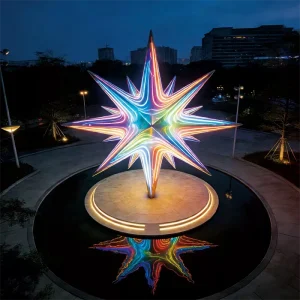 he “Starlume Prism” Multi-Point Light Sculpture is a landmark-grade installation designed to transform outdoor environments with its striking geometric form and vibrant chromatic illumination. Standing 5.2 meters tall with a 4.8-meter star diameter, this large outdoor light sculpture blends artistic expression with architectural lighting technology to create an unforgettable visual centerpiece.